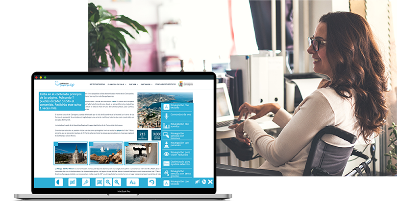 woman sitting in a wheelchair in front of a computer, in the foreground is another laptop showing the interface of a web accessibility tool running on a web page.